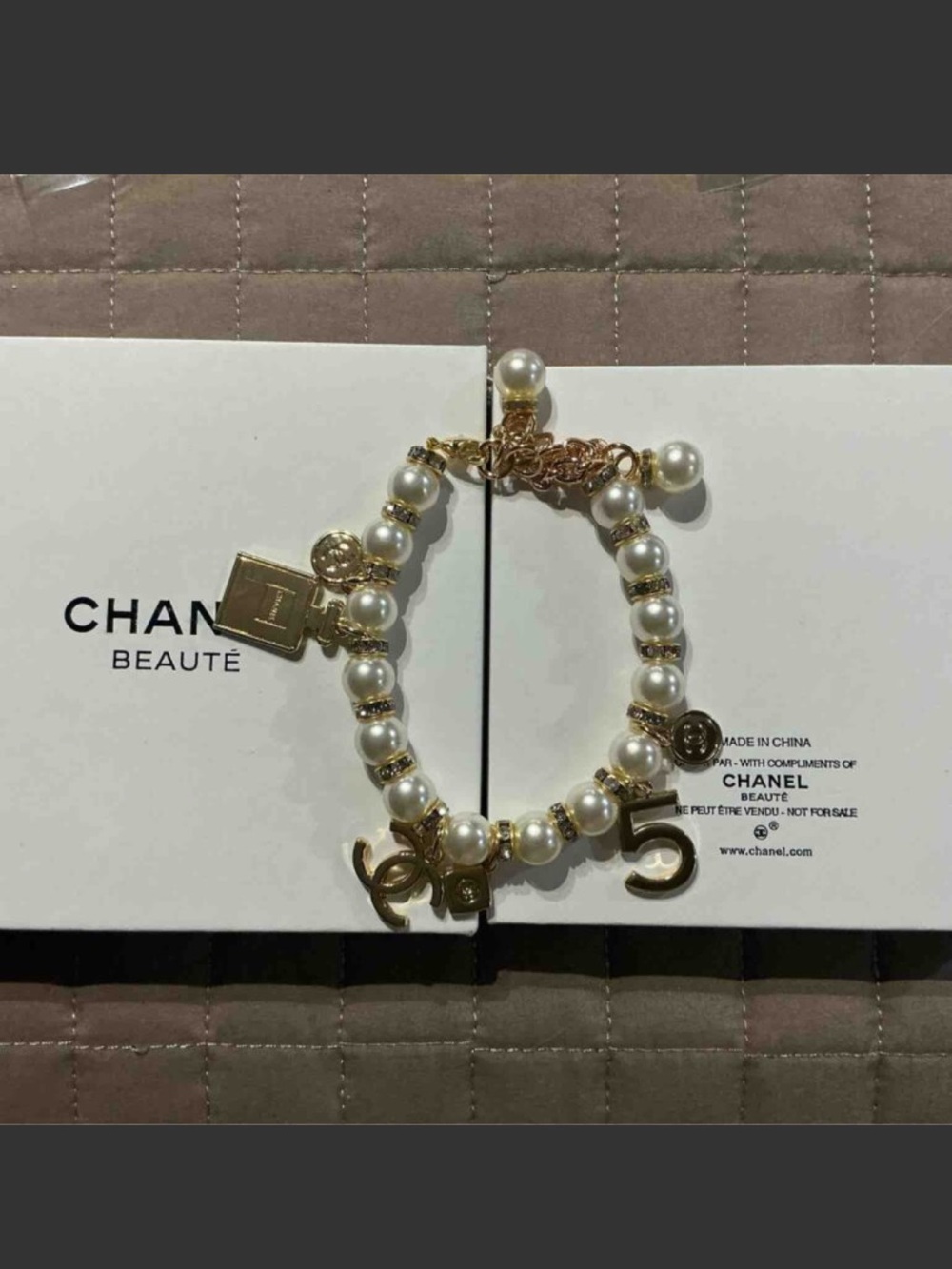 CHANEL Gold-Tone and White Pearl Charm Bracelet - Picture 6 of 7